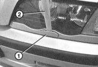 13.4.21 Снятие, установка и проверка форсунок фароомывателя BMW 3 (E46)