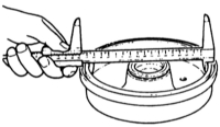 1.11.30  Проверка толщины тормозных колодок Mazda 323