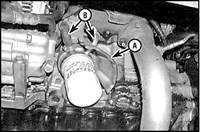 4.8 Масляный радиатор двигателя (6-цилиндровые модели) Mazda 626