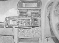 14.18 Снятие и установка аудиосистемы/ навигационного блока Opel Astra