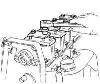 4.4.7 Снятие, проверка состояния и установка распределительного вала с корпусом газораспределительного механизма Opel Corsa