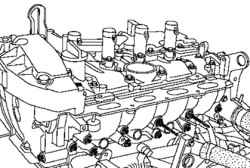 Откручивание болтов крепления подкладки корпусов форсунок